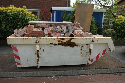 Team handling sofa removal in a London residential property