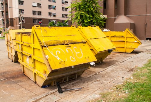 Commercial waste bins ready for collection outside a London business property