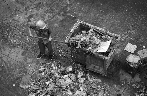 Collection team assessing rubbish volume for a transparent quote