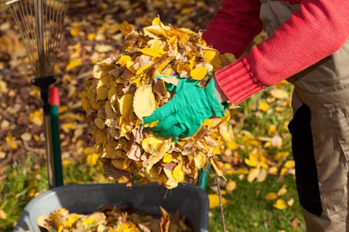 Rubbish removal crew handling mixed waste in London