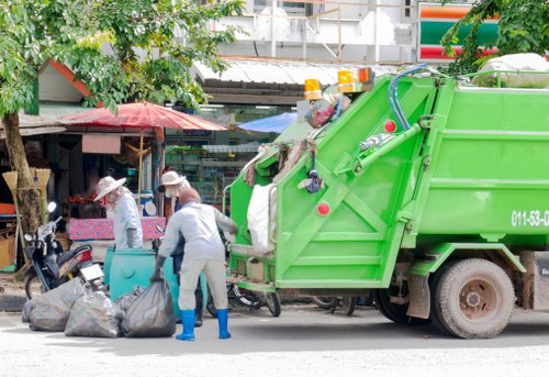 Waste removal vehicle loaded for a free-quote rubbish collection
