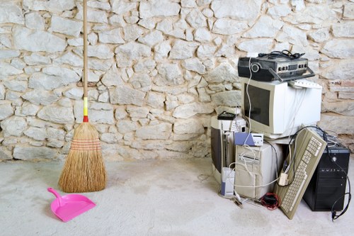 Waste removal team collecting bulky household items in London